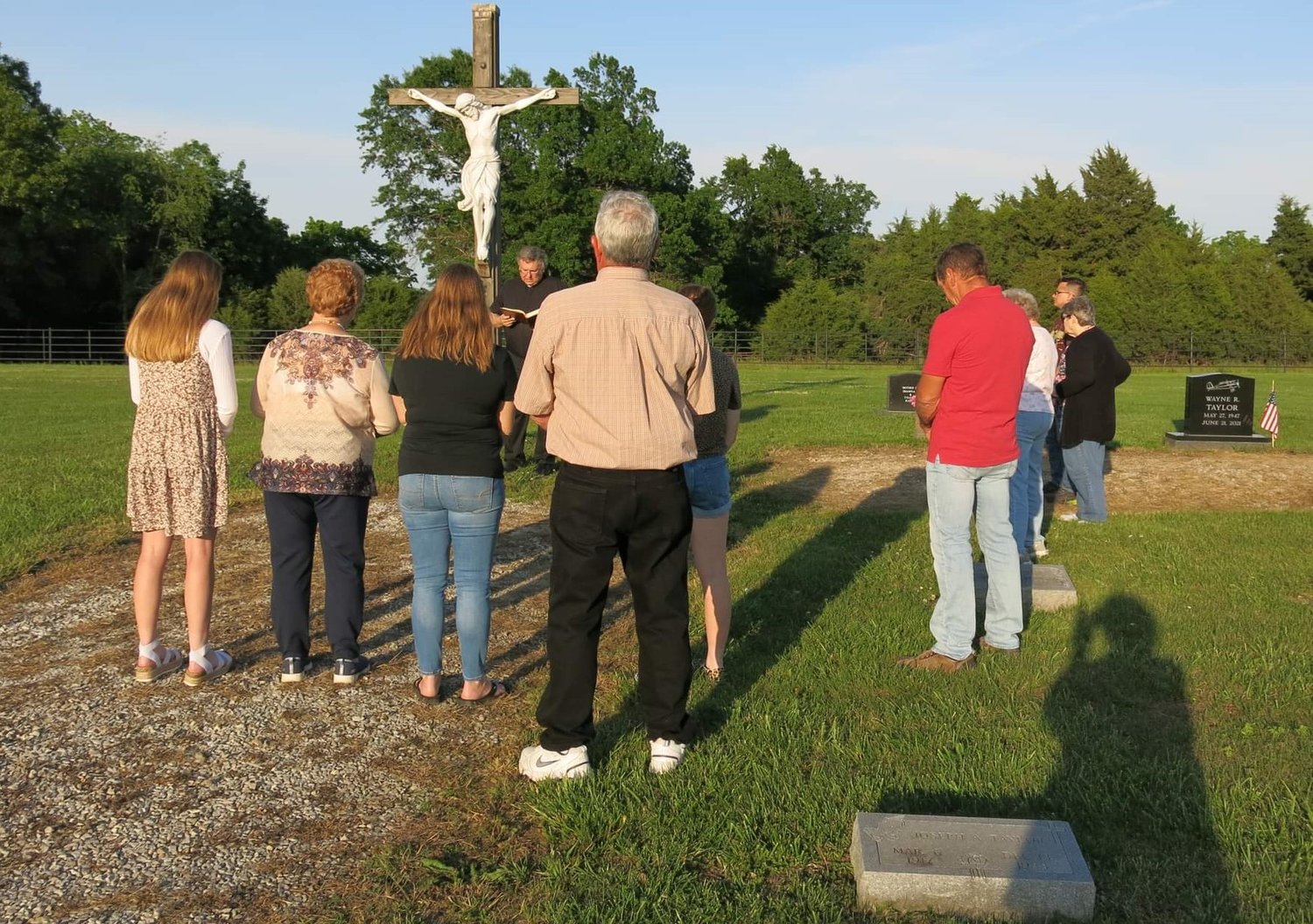 Catholics gather in St. Joseph Cemetery in Clifton City the Saturday before Memorial Day for Mass with Father Mark Smith and the blessing of the graves.